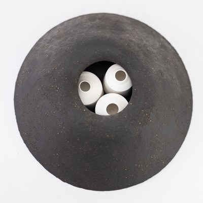 Lot 38 - ALISON REES; a grogged black stoneware casing...