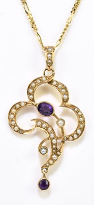 Lot 1371 - An Edwardian 9ct yellow gold amethyst and seed...