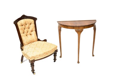 Lot 33 - A Victorian walnut framed low nursing side...