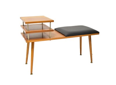 Lot 11 - A 1960s teak telephone table with two raised...