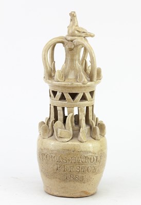 Lot 478 - A 19th century stoneware money box modelled...