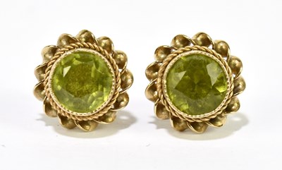 Lot 1503 - A pair of 9ct yellow gold and green peridot...