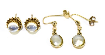 Lot 1509 - A pair of 9ct yellow gold moonstone ear studs,...