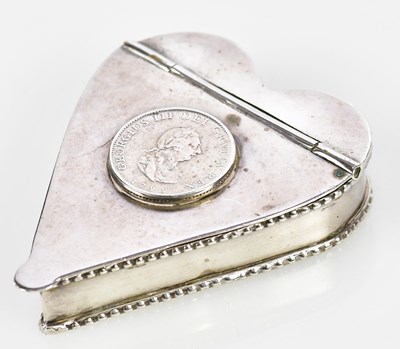 Lot 2075 - A George III silver plated heart shaped snuff...