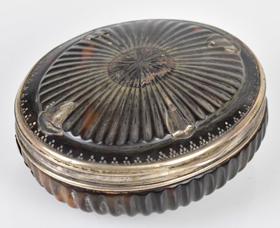 Lot 2080 - A George III tortoiseshell snuff box of oval...