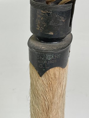 Lot 14 - A deer slot lampbase mounted on an oak base,...
