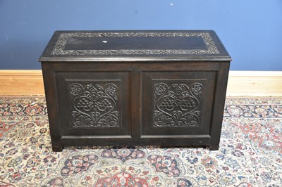Lot 6582 - An early 20th century Macclesfield carved oak...