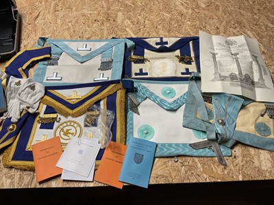 Lot 50 - A quantity of Masonic items to include aprons,...