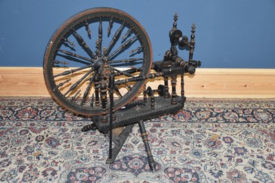 Lot 6675 - A 19th century ebonised spinning wheel with...