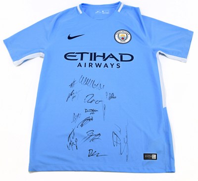 Lot 219 - MANCHESTER CITY; a part signed team home...