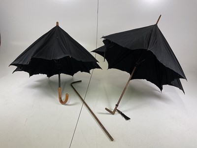 Lot 23 - Two vintage umbrellas and a walking stick (af).