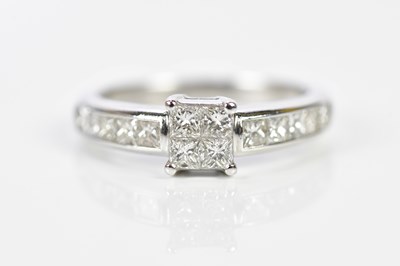 Lot 78 - An 18ct white gold dress ring, with a centre...