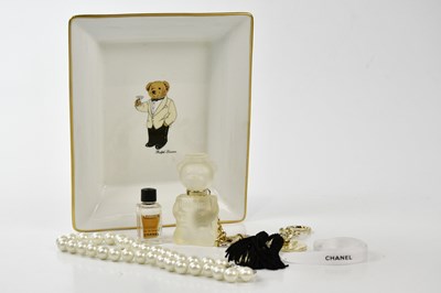 Lot 857 - RALPH LAUREN; a white ceramic Martini Bear...