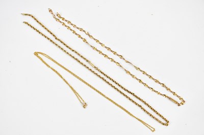 Lot 401 - Three 9ct/yellow metal chains, combined approx...