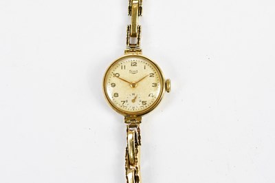 Lot 609 - LIMIT; a vintage 9ct yellow gold wristwatch...