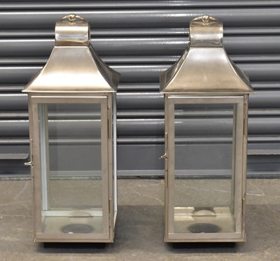 Lot 126 - A pair of modern stainless steel lanterns,...