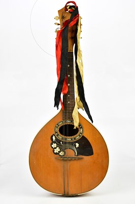 Lot 1413 - A flat back mandolin, with mother of pearl inlay.