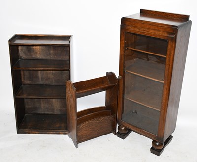 Lot 1652 - A 1930s oak glazed bookcase of small...