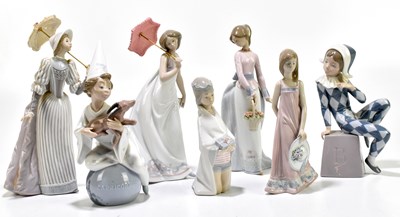 Lot 605 - LLADRO; a collection of seven figures...