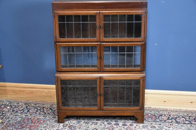 Lot 6625 - IN THE STYLE OF MINTY; a three tier bookcase...