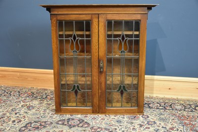 Lot 6674 - A circa 1900 Arts and Crafts oak bookcase top...