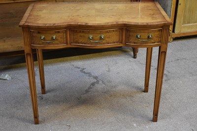 Lot 6738 - A reproduction burr oak serpentine fronted...