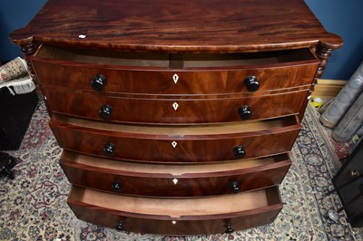 Lot 6584 - A 19th century mahogany bowfront chest,...