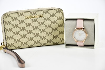 Lot 855 - MICHAEL KORS; a coated canvas unused monogram...