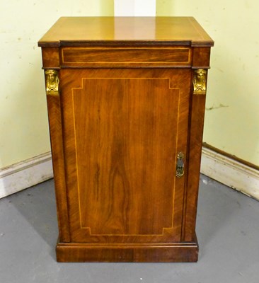 Lot 20 - A Regency rosewood single door music cabinet...