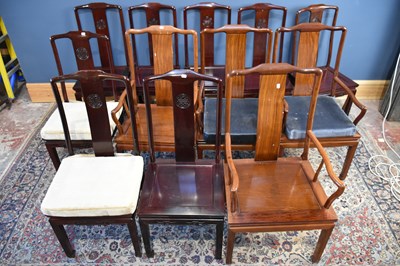 Lot 6583 - A set of four Chinese hardwood elbow chairs...