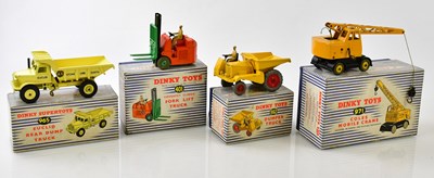 Lot 4562 - DINKY SUPERTOYS; four boxed model vehicles,...