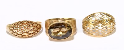 Lot 1100 - Three 9ct yellow gold rings including a bombé...