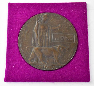 Lot 613 - A WWI remembrance plaque for Harry Scattergood.
