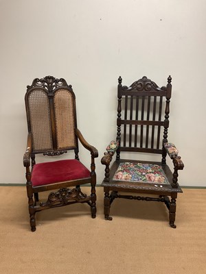 Lot 535 - Two oak carved hall chairs.