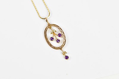 Lot 405 - A 9ct yellow gold fine link chain supporting...
