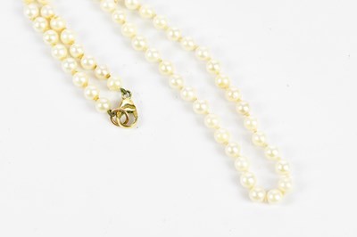 Lot 567 - A hand tied string of cultured pearls with 9ct...