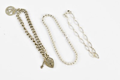 Lot 568 - Three silver bracelets, combined approx 24.4g...