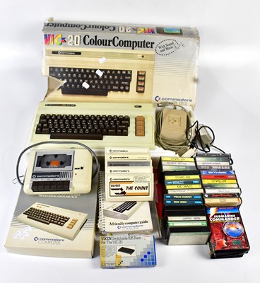 Lot 4475 - COMMODORE; a VIC20 colour computer, together...