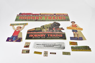 Lot 5056 - HORNBY TRAINS; an advertising card sign...