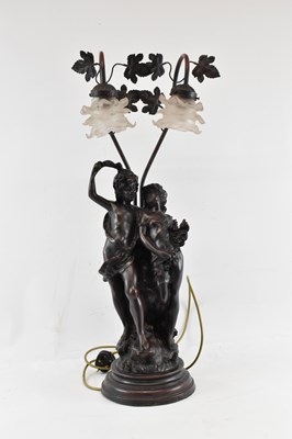 Lot 112 - A spelter figural table lamp, with two glass...