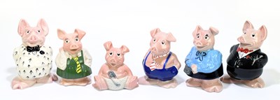 Lot 589 - WADE; a family of five Nat West pig money...