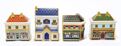 Lot 687 - ROYAL CROWN DERBY; four paperweight comprising...