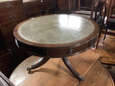 Lot 6742 - A reproduction mahogany drum coffee table with...