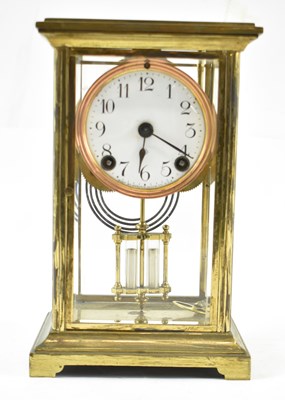Lot 159 - An early 20th century French four glass brass...