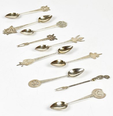 Lot 1096 - A group of eight Eastern white metal teaspoons,...