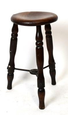 Lot 1482 - A late 19th century stained pine and iron...