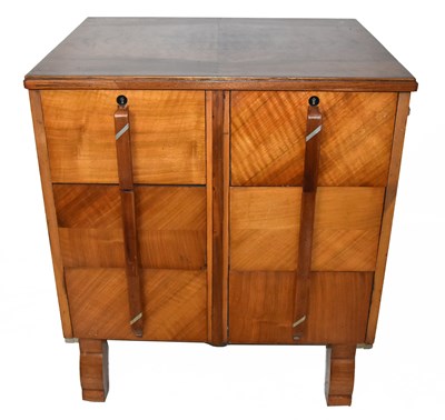 Lot 1719 - An Art Deco walnut chest with six short...