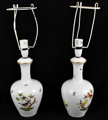 Lot 824 - HEREND; a pair of porcelain lamps, with...