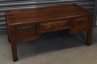 Lot 17 - A Chinese hardwood three drawer coffee table,...
