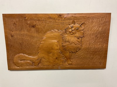 Lot 244 - A carved oak plaque shaped in the form of a...